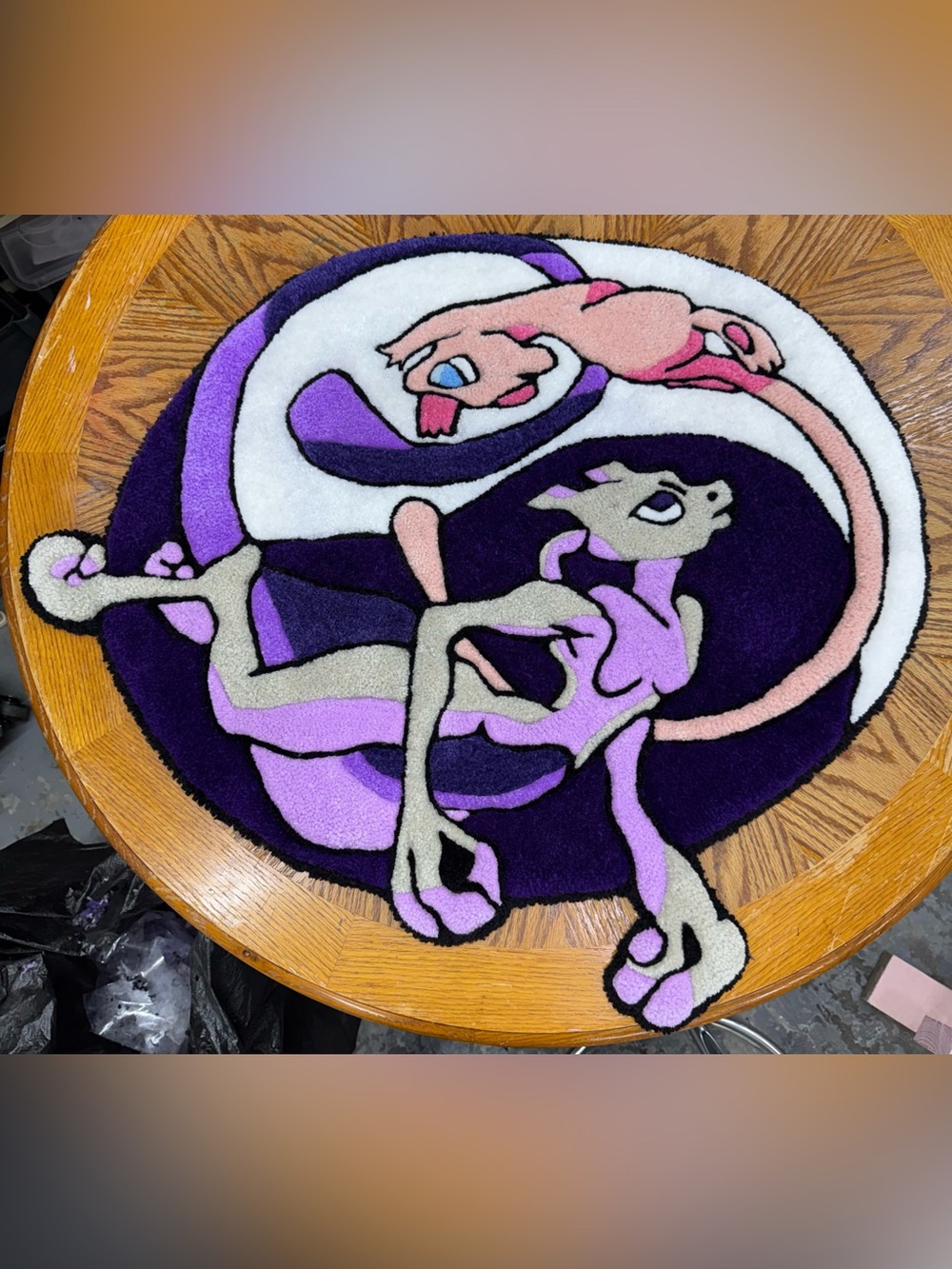 This is a Mewtwo hand-tufted custom rug from
Pokémon 34"x31"